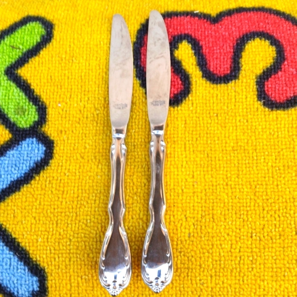2 Noritake Mo- stainless steel Japan NTK butter knives brand new....